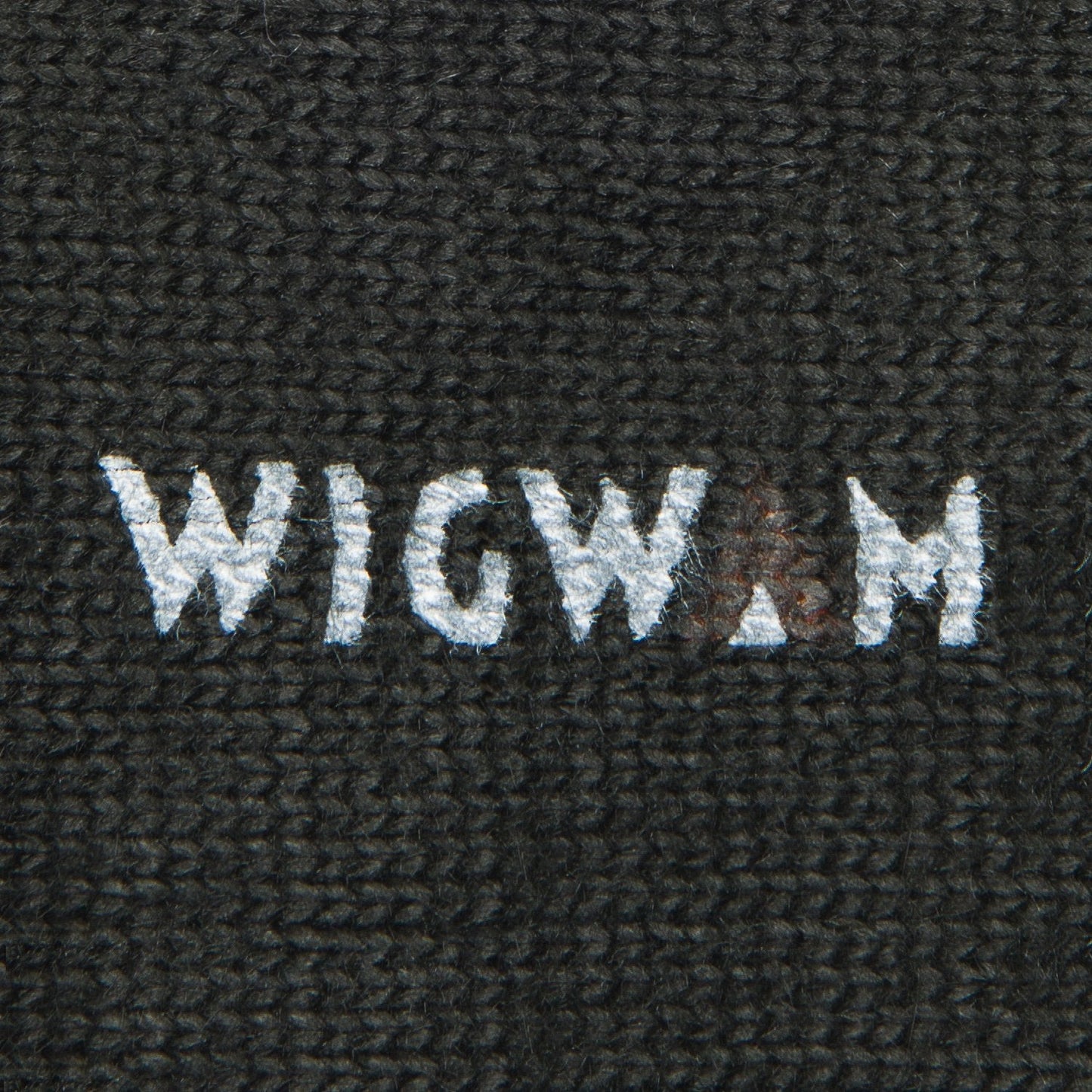 Black knit-in logo